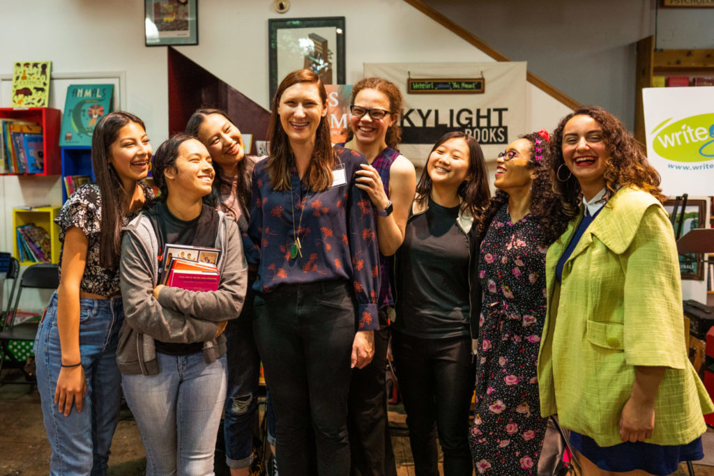 srcset=http://en-gd52mu8.edirectorycloud.com/custom/domain_1/image_files/uploads/2020/03/writegirl-managing-director-katie-geyer-and-writegirl-mentees-alums-at-skylight-photo-credit-morgan-pirkle-writegirl-378697-1024x683.jpg width=1024